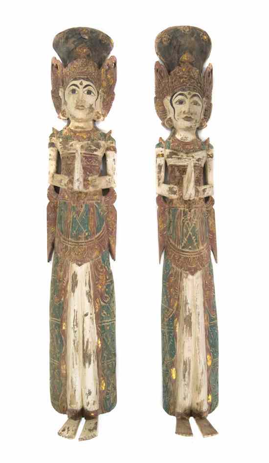 Appraisal: A Pair of Balinese Carved Figures each depicted standing in