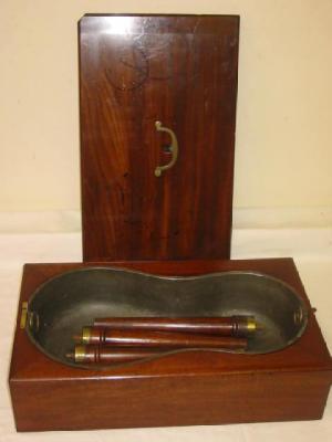 Appraisal: A MAHOGANY CAMPAIGN BIDET the detachable lid with moulded edge