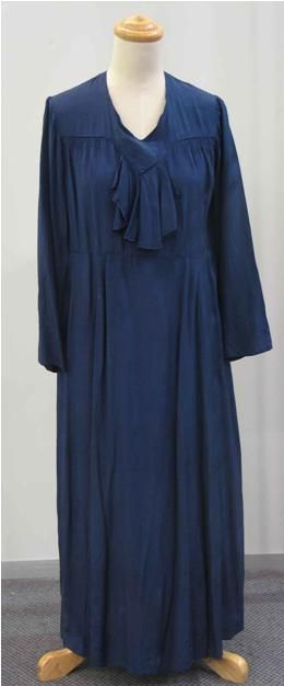 Appraisal: Dress in navy cotton with tie detail to the neck