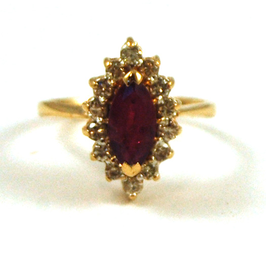 Appraisal: RUBY DIAMOND AND FOURTEEN KARAT GOLD RING with round-cut diamonds