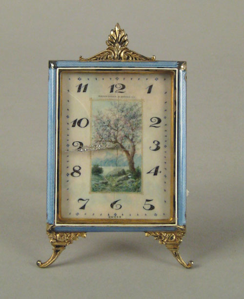 Appraisal: Swiss metal dore and guilloche clock ca with painted ivory