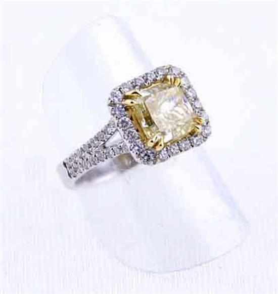 Appraisal: Natural fancy intense yellow diamond and platinum ring ct intense