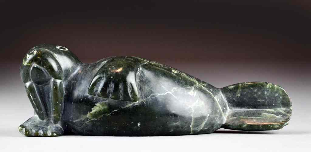 Appraisal: Inuit Stone Carving of Walrusl - Depicting a reclining walrus