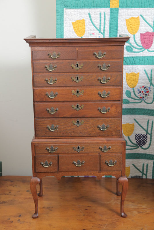 Appraisal: MINIATURE HIGHBOY Walnut two piece with two over five graduated