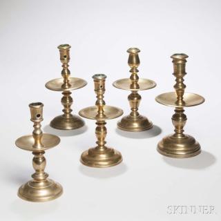 Appraisal: Five Continental Brass Candlesticks th th century knopped stems wide