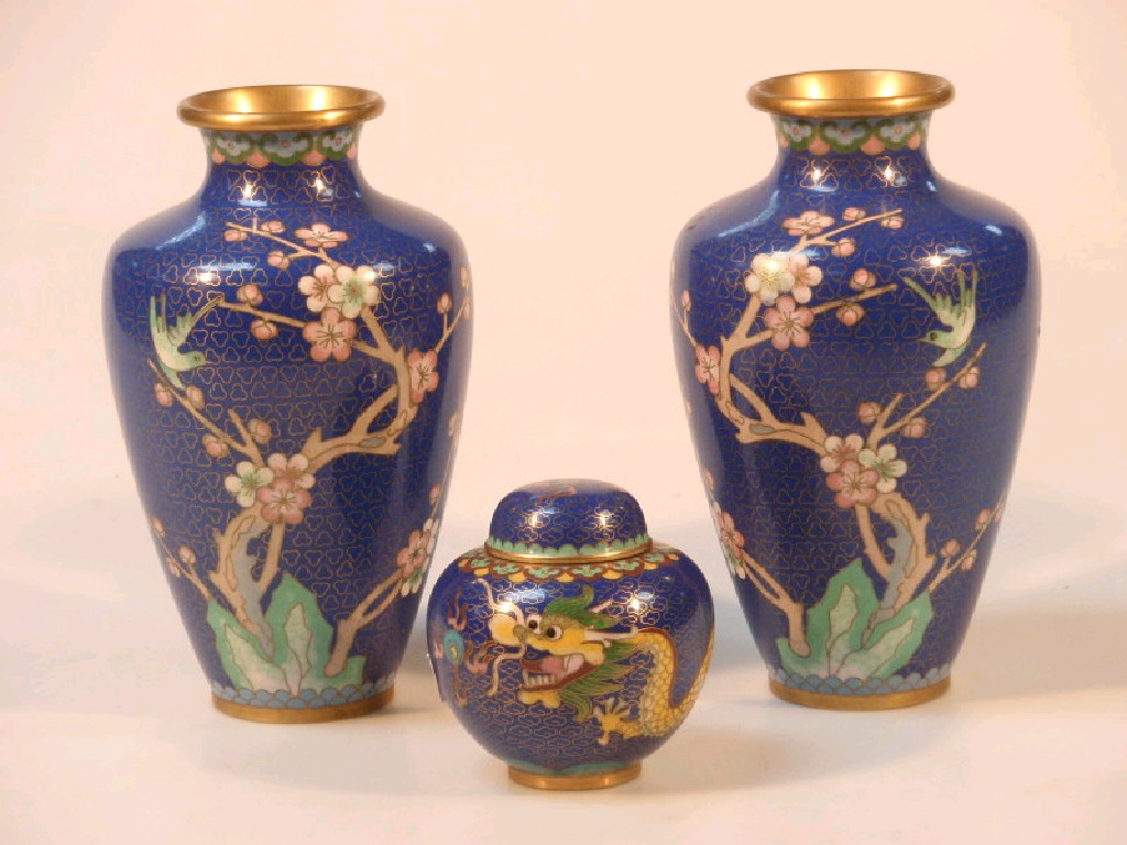 Appraisal: A pair of cloisonne vases with flowering branch and bird