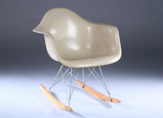 Appraisal: HERMAN MILLER MOLDED FIBERGLASS ROCKING CHAIR th century with maple