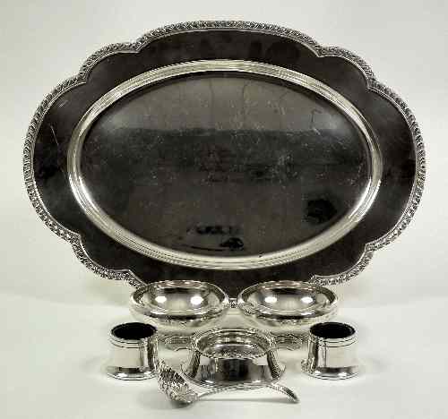 Appraisal: A George VI silver two-handled tea strainer and stand ins