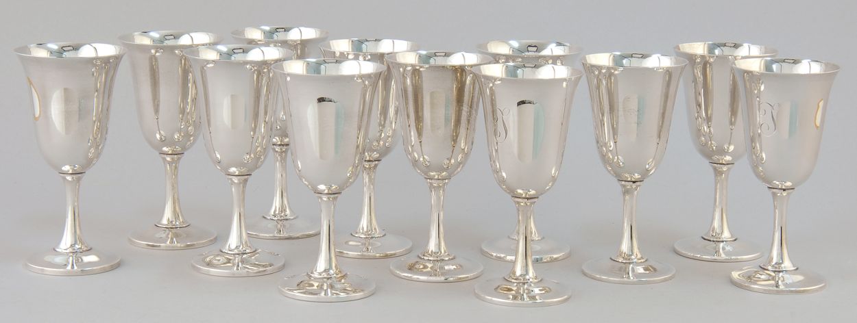 Appraisal: TWELVE WALLACE STERLING SILVER WATER GOBLETS Four monogrammed T Height