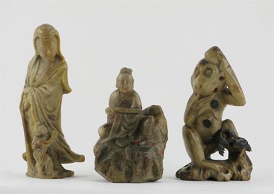 Appraisal: A Chinese soapstone carving of Guanyin pouring out water from