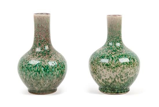 Appraisal: A Pair of Peachbloom Glazed Porcelain Bottle Vases Height of