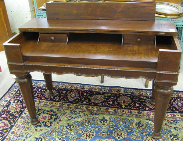 Appraisal: VICTORIAN ROSEWOOD SPINET DESK American th century The rectangular table-like