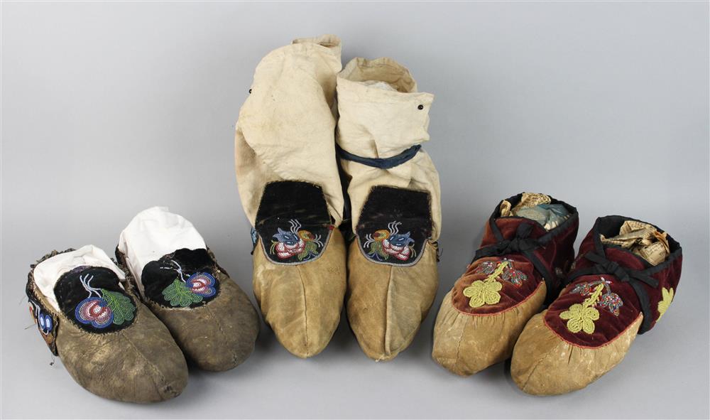 Appraisal: THREE PAIRS OF WOODLANDS BEADED CLOTH AND HIDE MOCCASINS floral