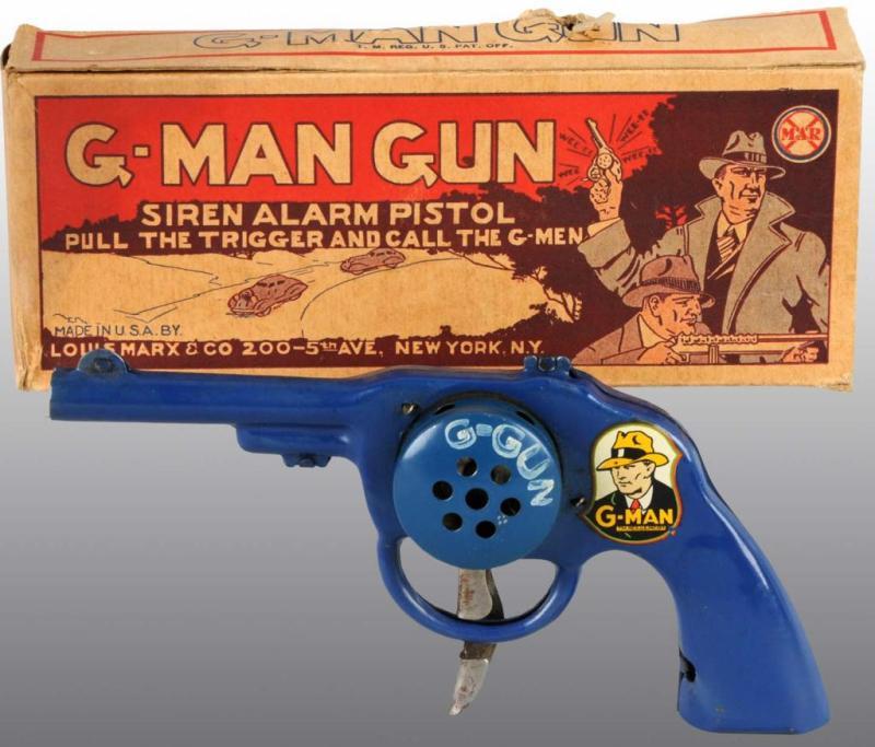 Appraisal: Marx G-Man Siren Alarm Toy Gun Description 's Found from