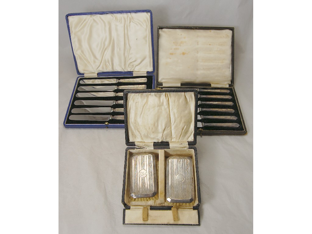 Appraisal: Two cases of silver-handled stainless steel bladed tea knives to