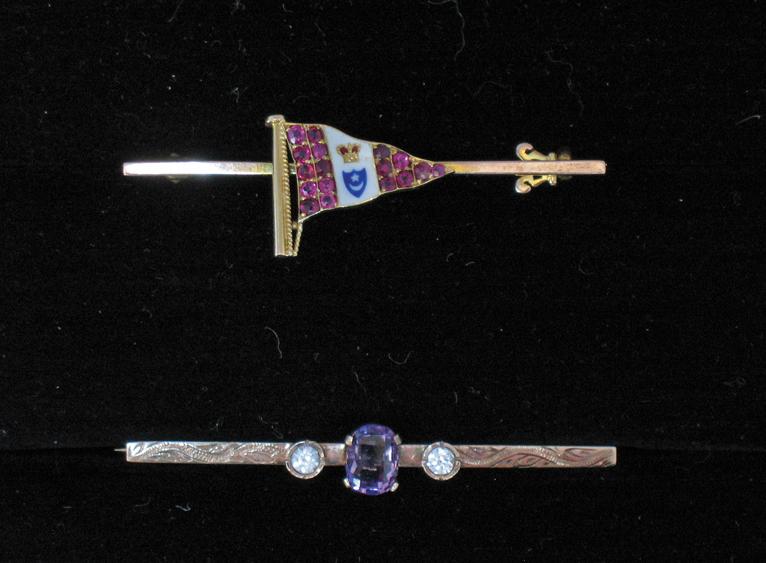 Appraisal: A YELLOW GOLD STICK PIN mounted with a pave-set ruby