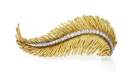 Appraisal: An Karat Gold and Diamond Feather Pendant Brooch in a