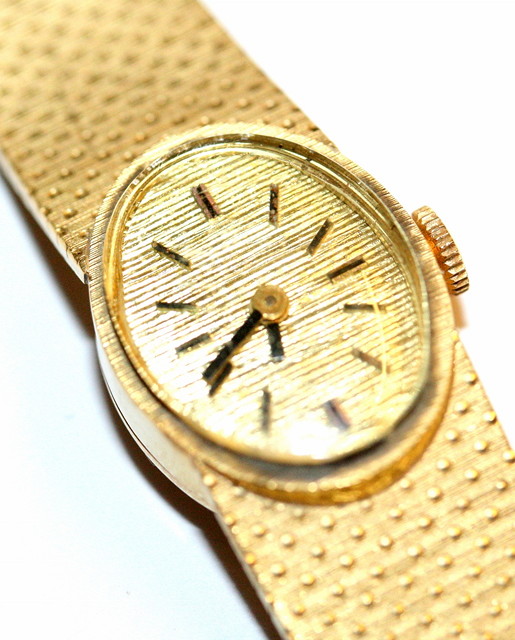 Appraisal: A LADIES CT GOLD WRIST WATCH with oval gilt dial