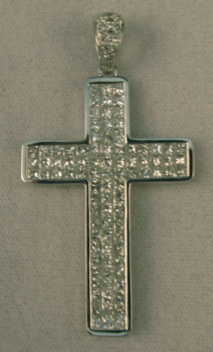 Appraisal: DIAMOND AND EIGHTEEN KARAT WHITE GOLD CROSS PENDANT with princess-cut