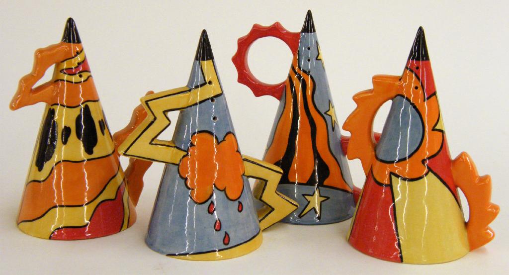 Appraisal: Four conical sugar sifters including 'Thunderbolt' 'Sunset' 'Fire' and 'Comet'