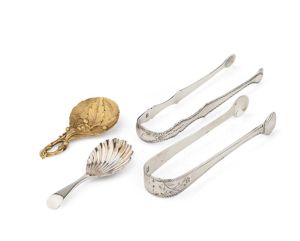 Appraisal: GROUP OF SILVER SUGAR NIPS AND CADDY SPOONS comprising two