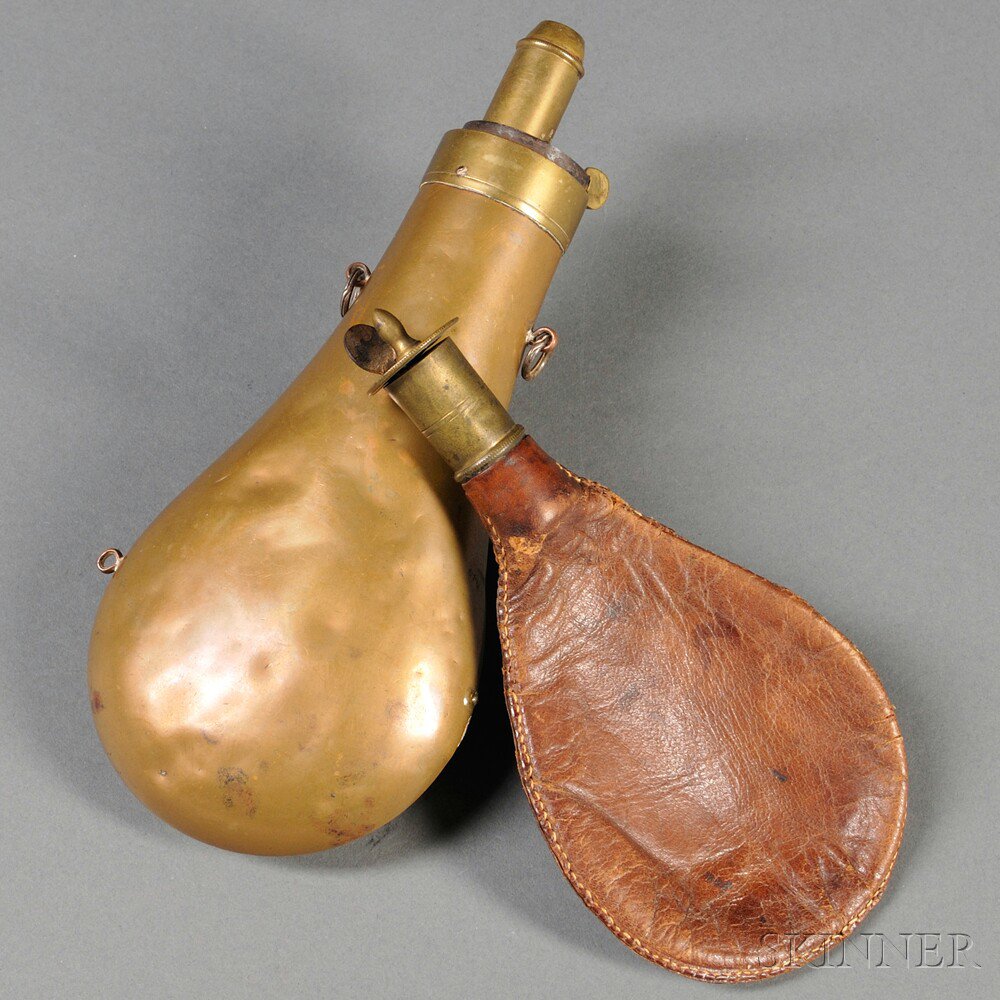 Appraisal: Two Powder Flasks c mid- th century one leather with