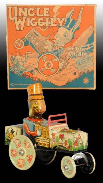 Appraisal: Marx Tin Wind-Up Uncle Wiggly Toy Car Description Includes original