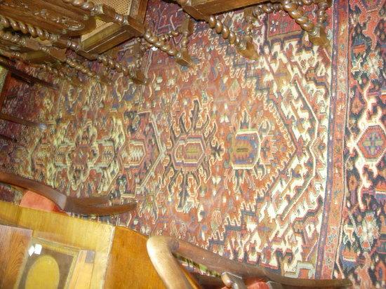 Appraisal: A HERIZ SMALL CARPET with typical medallion on a rust