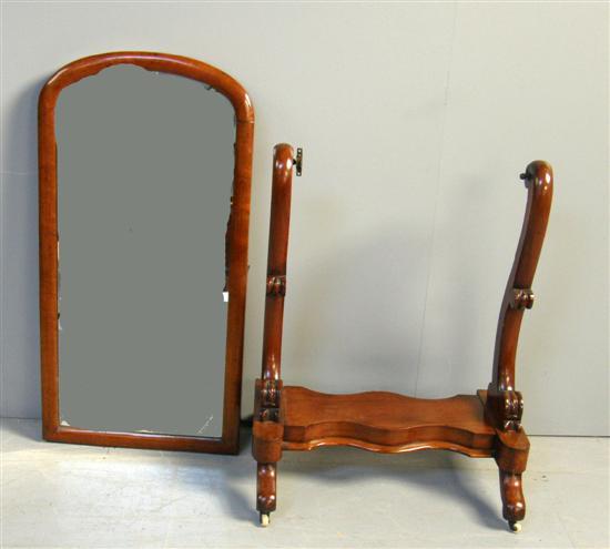 Appraisal: th century mahogany cheval mirror with twin end shaped supports