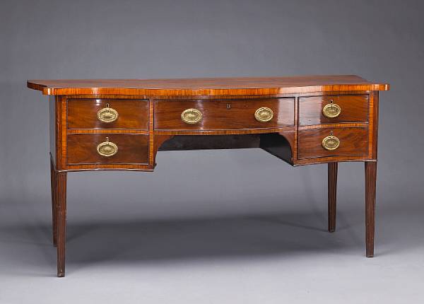 Appraisal: A George III crossbanded mahogany serpentine sideboard last quarter th