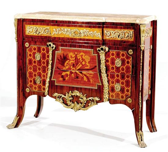 Appraisal: Continental mixed wood and ormolu-mounted commode breakfront marble top over