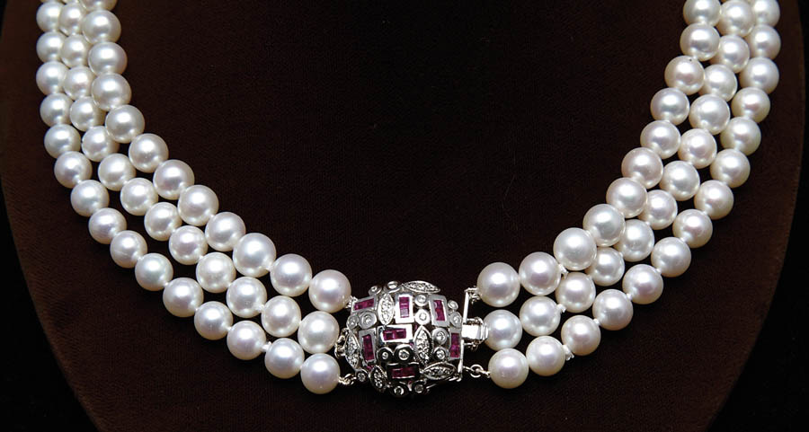 Appraisal: THREE ROW PEARL NECKLACE Beautiful cultured pearl necklace consists of