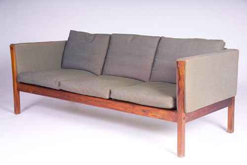 Appraisal: HANS WEGNER Rosewood even-arm sofa with blue-green fabric upholstery Unmarked