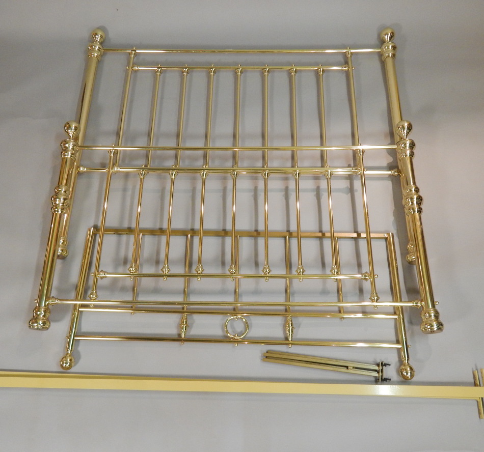 Appraisal: A solid brass Victorian style kingsize bed head and foot