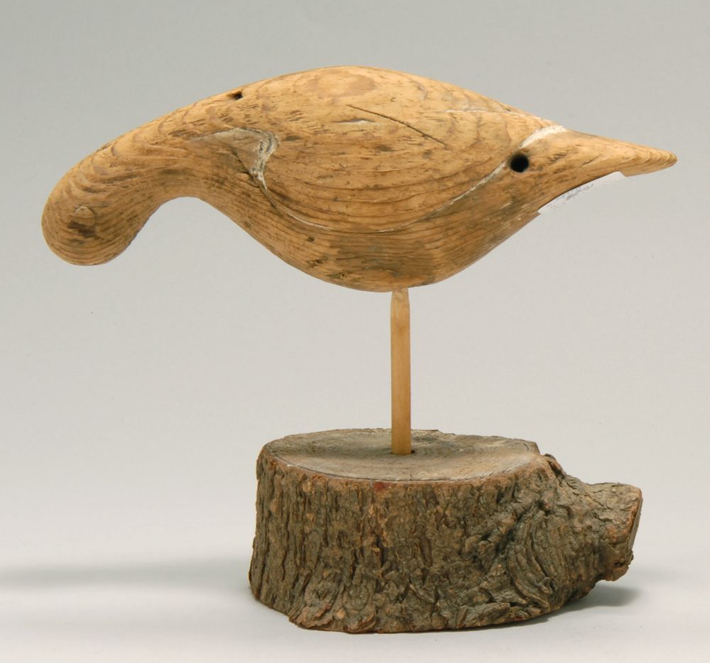 Appraisal: PLOVER DECOY Late th CenturyIn feeding form with carved wing