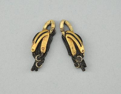 Appraisal: A Pair of Equestrian Design Menuki Bits and bridles design