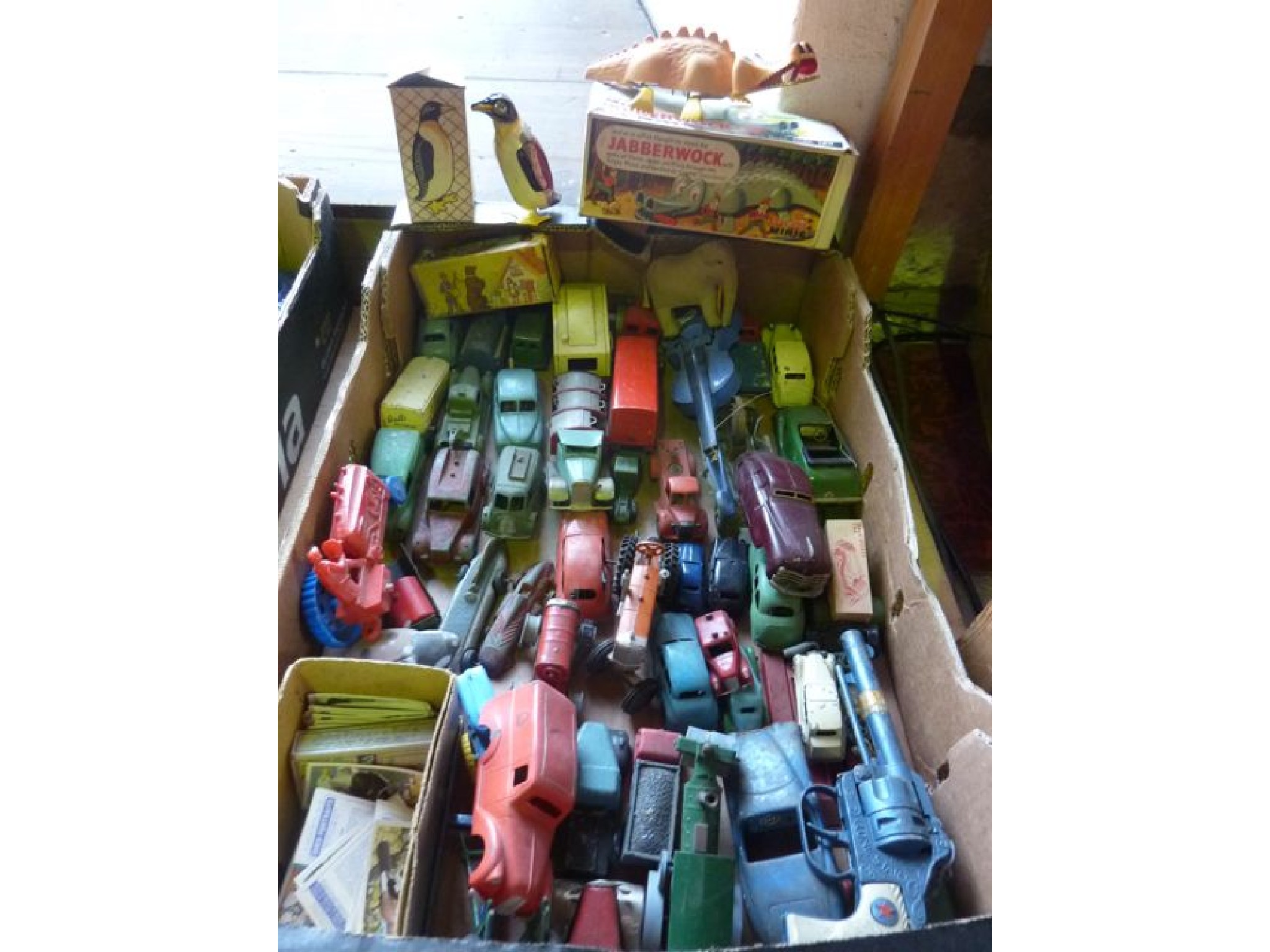 Appraisal: A box containing a quantity of vintage model vehicles to