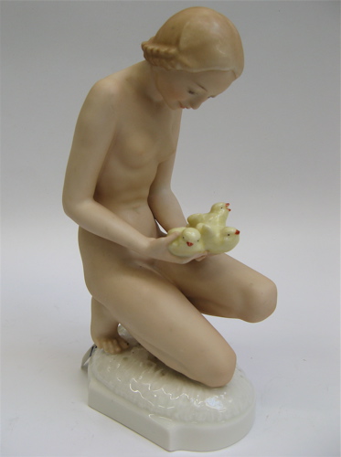 Appraisal: BAVARIAN HUTSCHENREUTHER PORCELAIN FIGURE unglazed painted nude female seated on