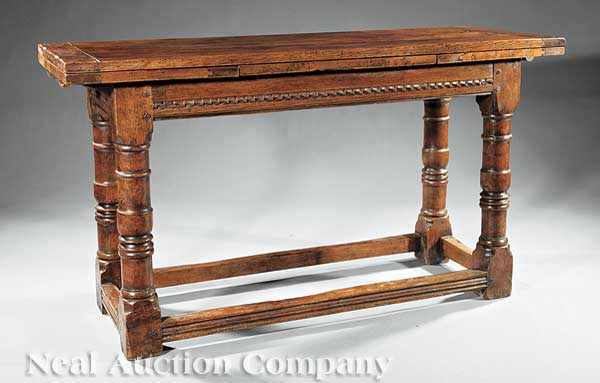 Appraisal: A French Renaissance-Style Carved Oak Draw-Leaf Dining Table th c