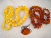 Appraisal: An amber necklace length cm a bead necklace length cm