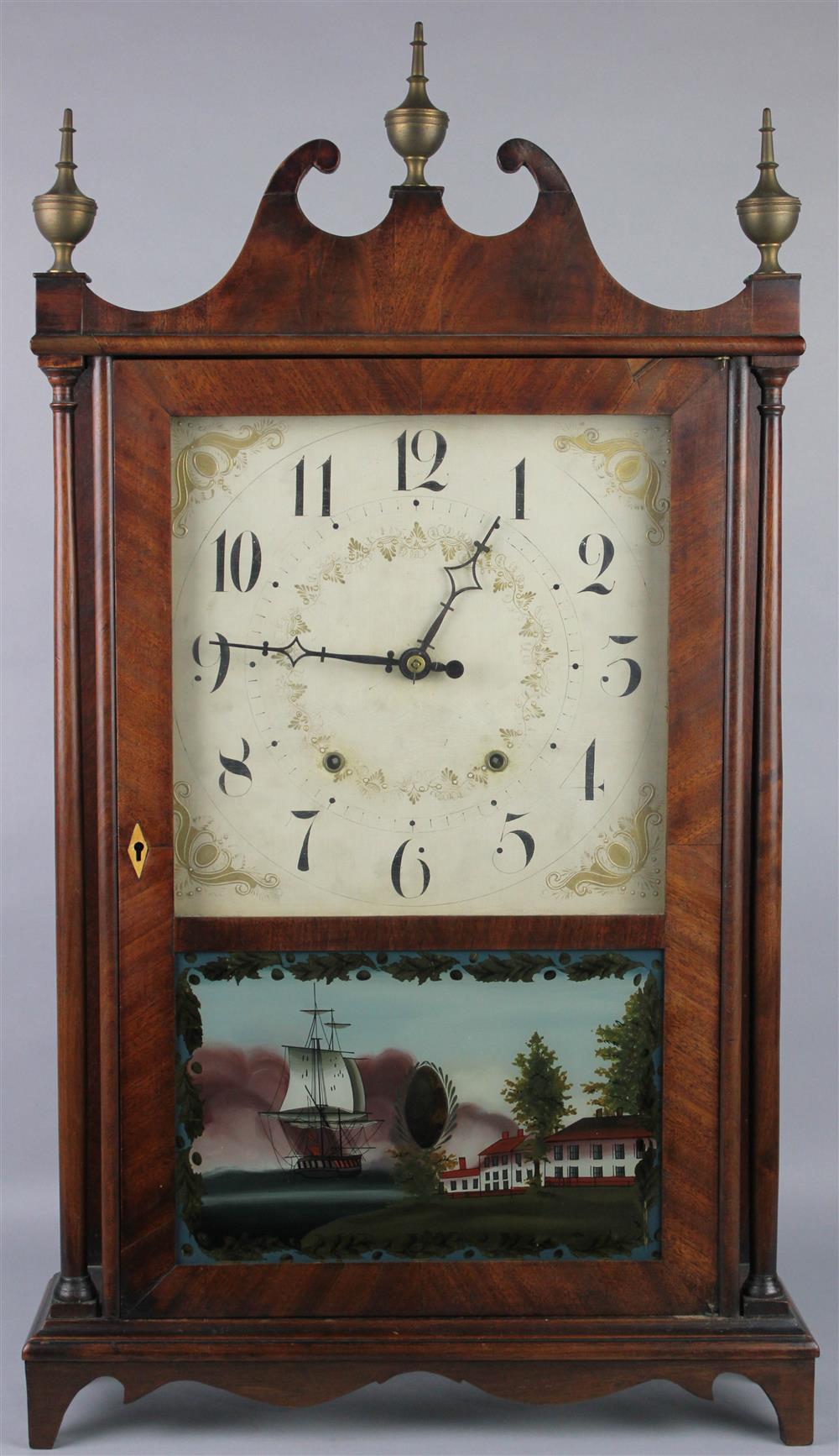 Appraisal: SETH THOMAS MAHOGANY PILLAR AND SCROLL CLOCK having a swan