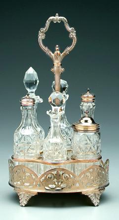 Appraisal: Silver plate and glass cruet silver plated frame openwork sides