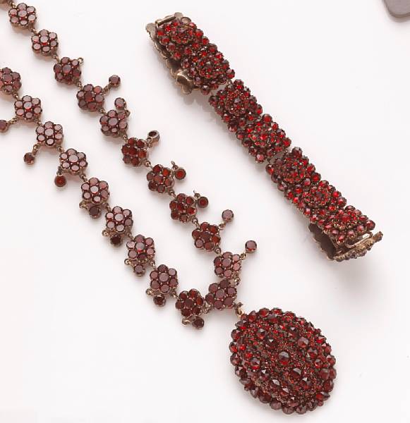 Appraisal: A Bohemian garnet necklace and bracelet lengths and in stones