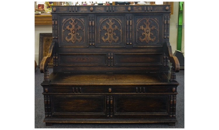 Appraisal: Oak Monks Bench With Carved Back The Hinged Seat Opens