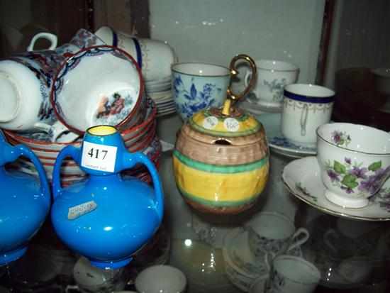 Appraisal: A SHELF OF EDWARDIAN AND VICTORIAN CUPS SAUCERS AND PLATES