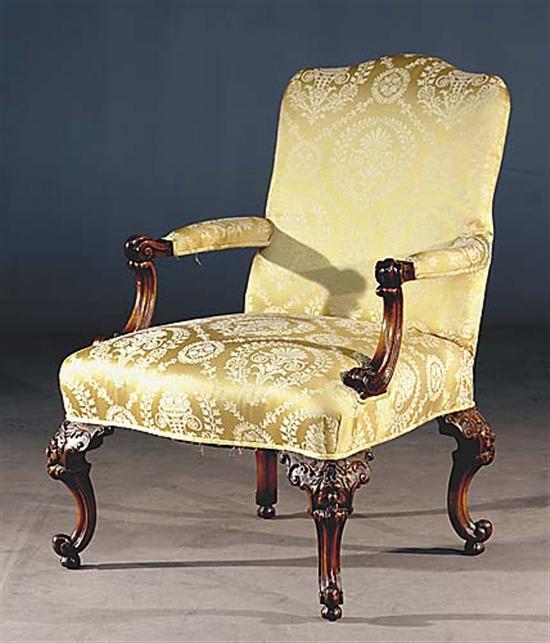 Appraisal: Georgian style library armchair last half th centuryarched top with