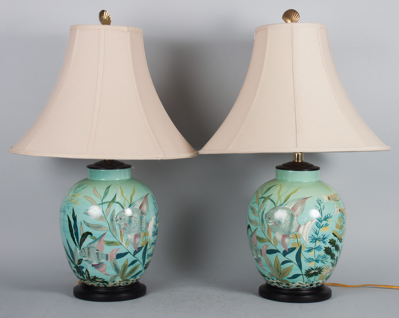 Appraisal: Pair of ceramic vase lamps with painted tropical fish decoration