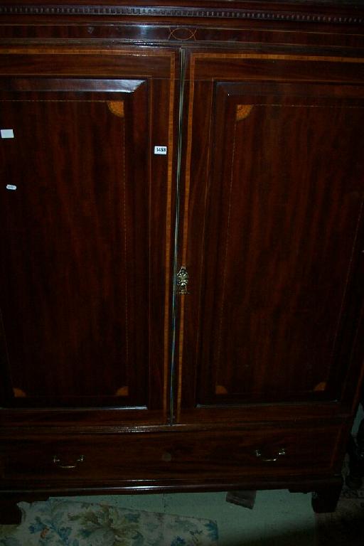 Appraisal: A th century mahogany hanging cupboard enclosed by two panelled