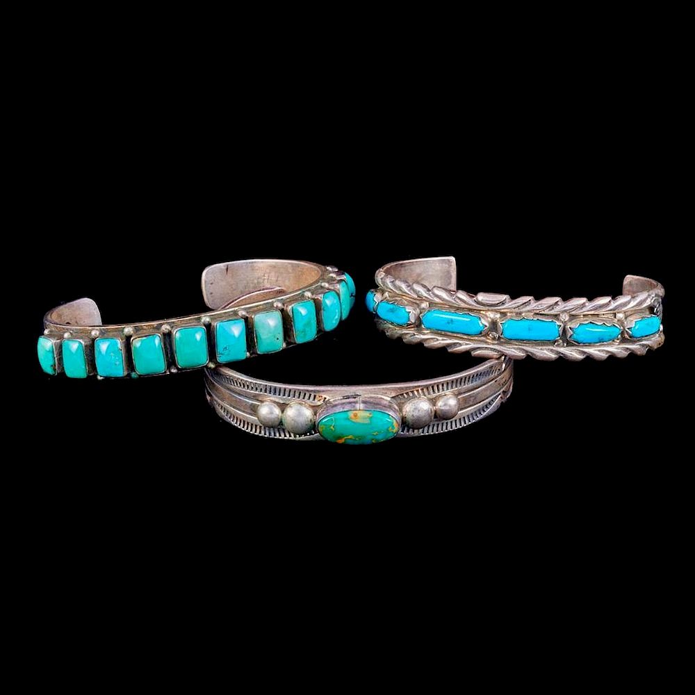 Appraisal: NAVAJO CUFF BRACELETS Three old pawn turquoise and silver cuff