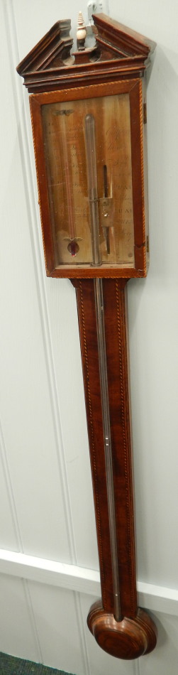 Appraisal: A thC stick barometer the mahogany case with a chequer